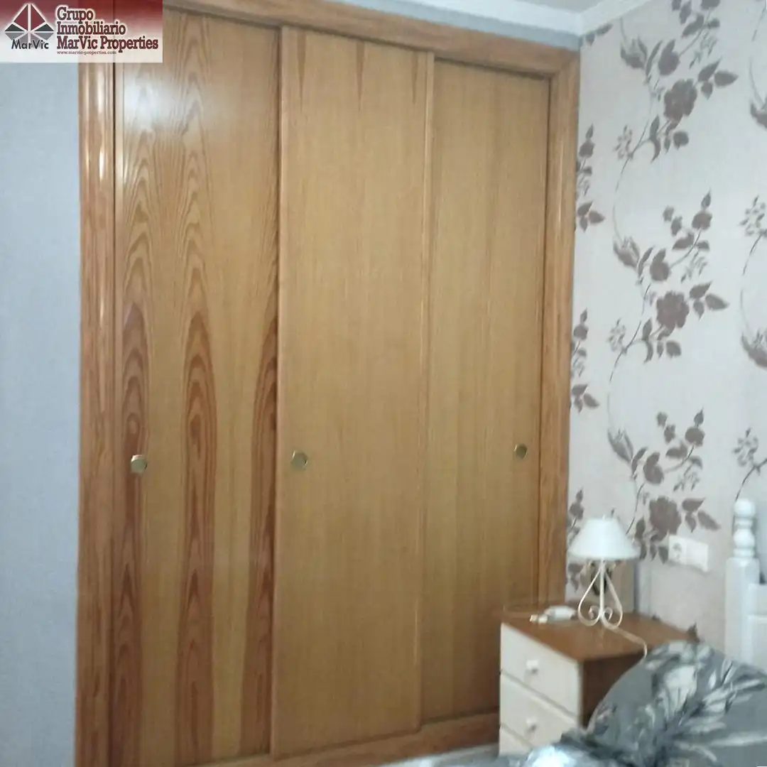 Habitación de Apartamento en venta en Benidorm con Jardín privado, Amueblado y Piscina comunitaria