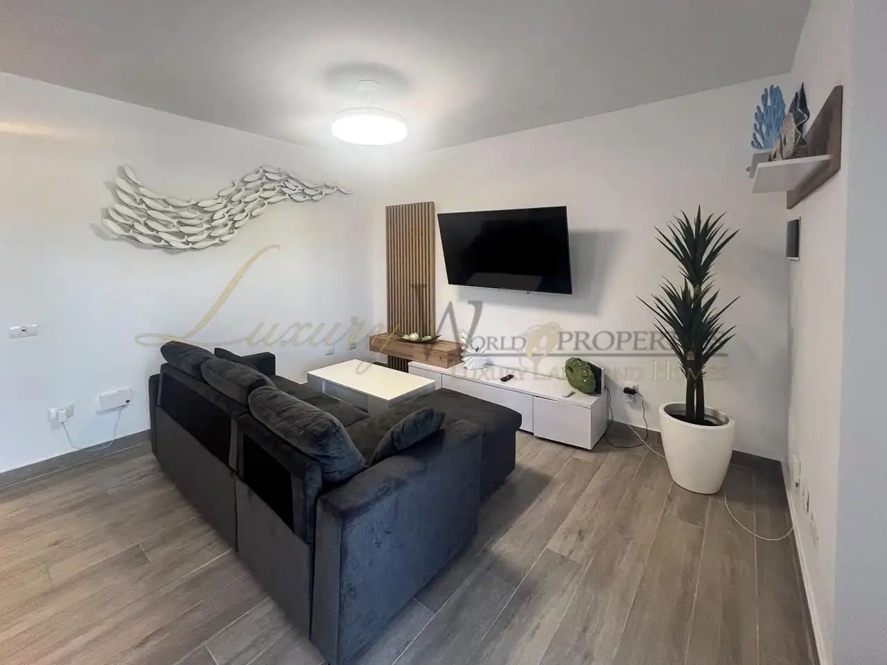 Sala d'estar de Planta baixa en venda en Santiago del Teide amb Terrassa, Moblat i Piscina comunitària