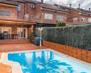 Swimming pool of Single-family semi-detached for sale in  Madrid Capital  with Air Conditioner, Terrace and Swimming Pool