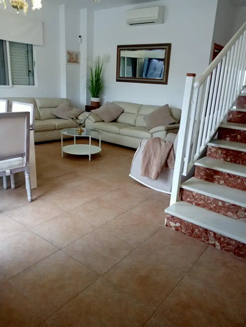 Sala de estar de Casa adosada en venta en Cullera con Aire acondicionado, Terraza y Balcón