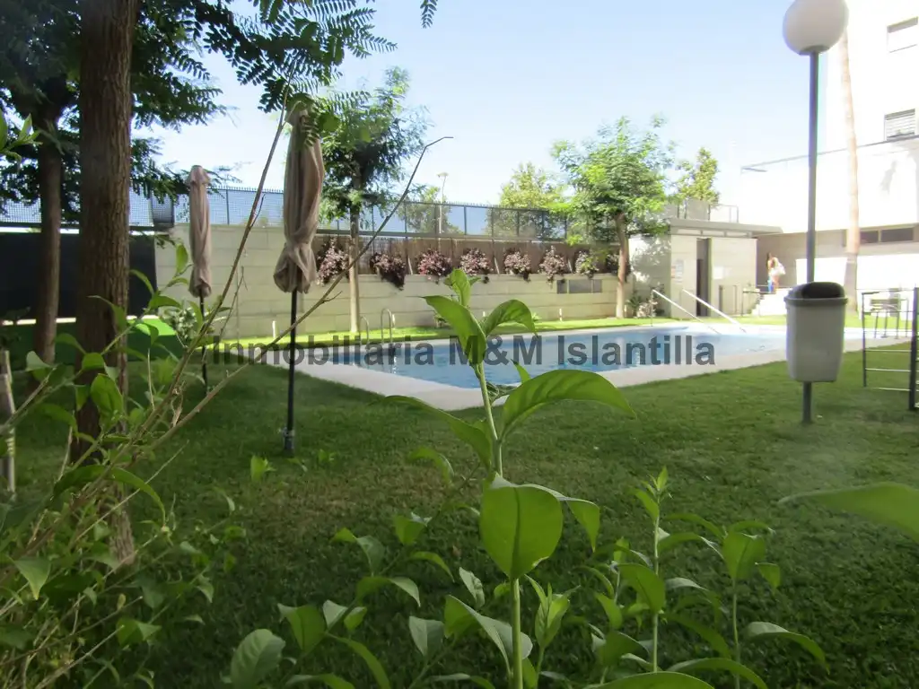 Piscina de Piso en venta en Isla Cristina con Terraza, Horno y Lavadora