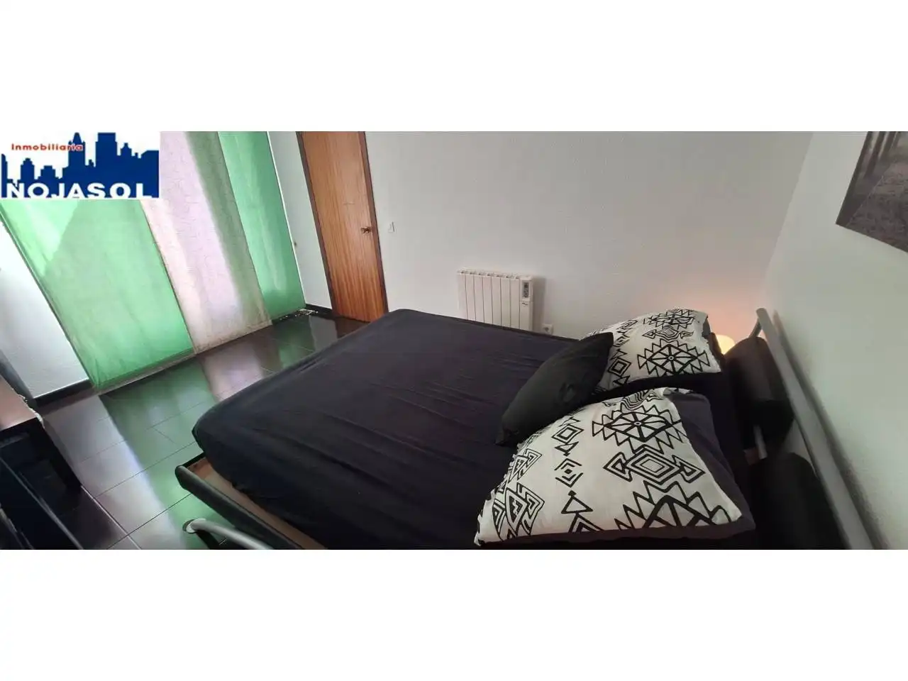 Dormitori de Apartament de lloguer en Noja amb Calefacció, Terrassa i Moblat