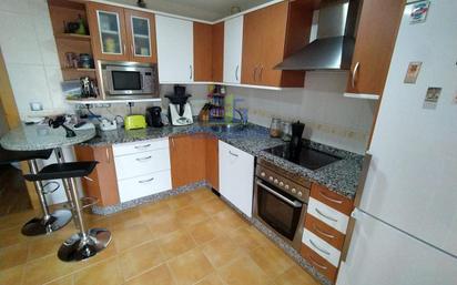 Kitchen of Duplex for sale in Villaquilambre  with Heating, Terrace and Storage room