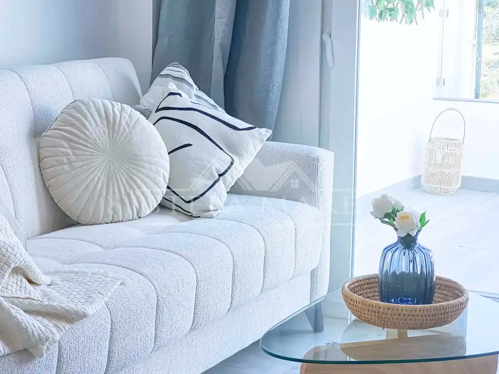 Sala de estar de Casa adosada en venta en Nerja con Aire acondicionado, Terraza y Amueblado