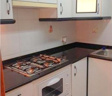 Kitchen of Flat for sale in L'Hospitalet de Llobregat  with Air Conditioner, Heating and Oven