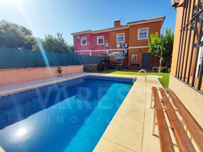 Swimming pool of Single-family semi-detached for sale in Espartinas