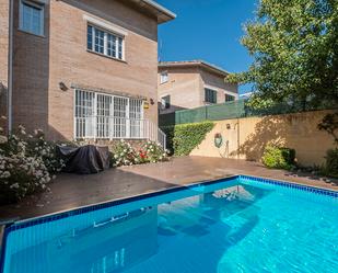 Swimming pool of House or chalet for sale in  Madrid Capital  with Swimming Pool