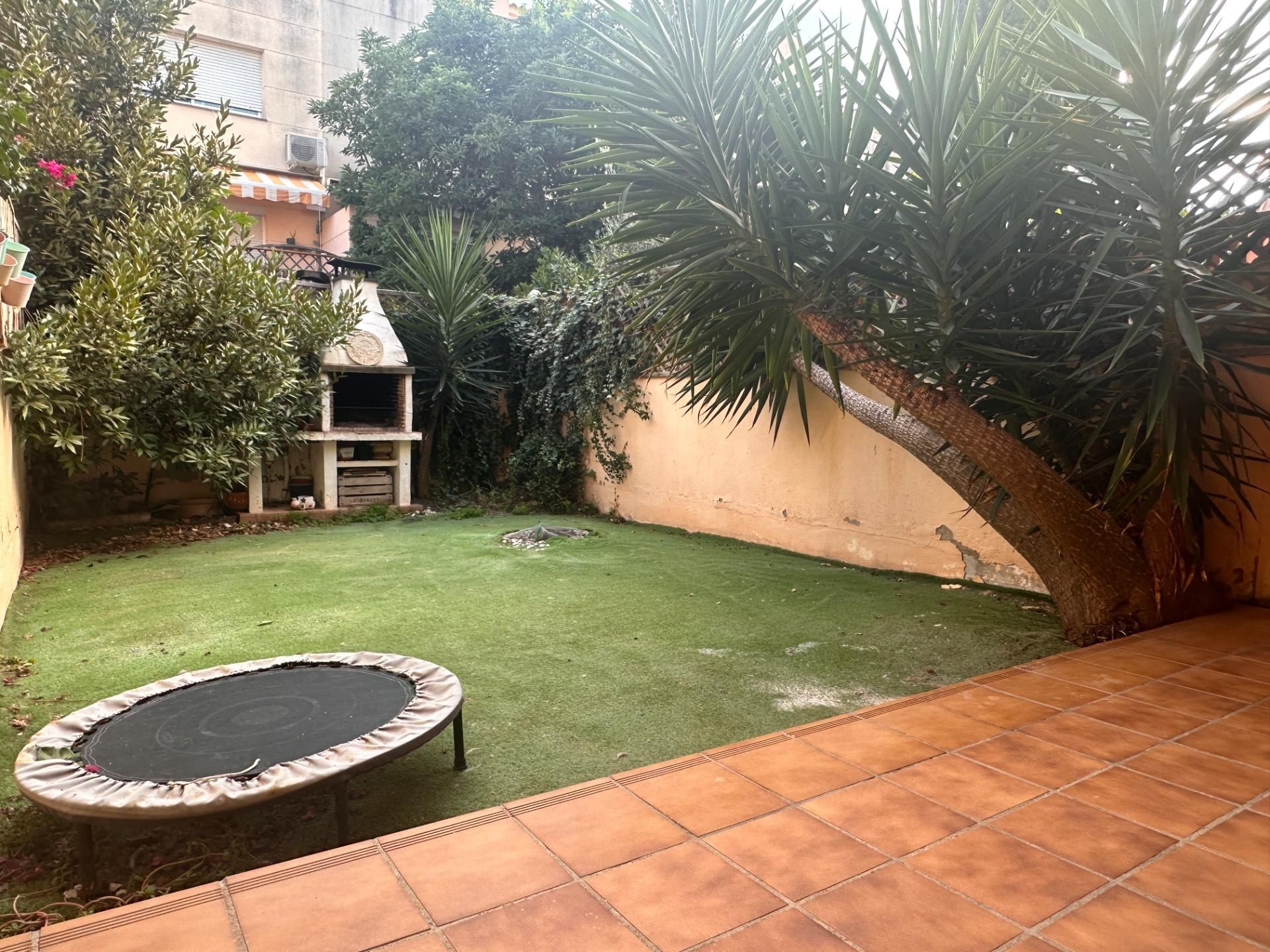 Jardí de Casa adosada en venda en Castellar del Vallès amb Calefacció, Jardí privat i Parquet