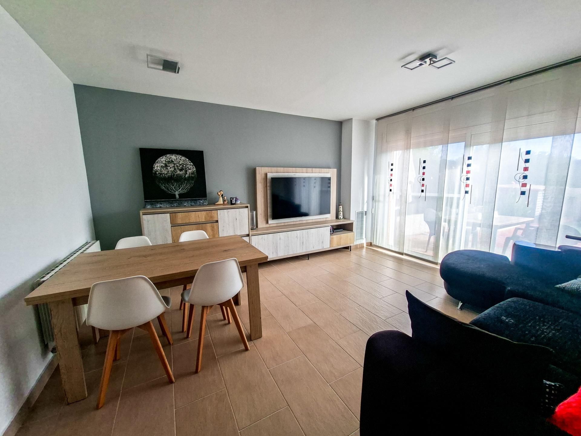 Sala d'estar de Casa adosada en venda en Vila-seca amb Aire condicionat, Jardí privat i Terrassa