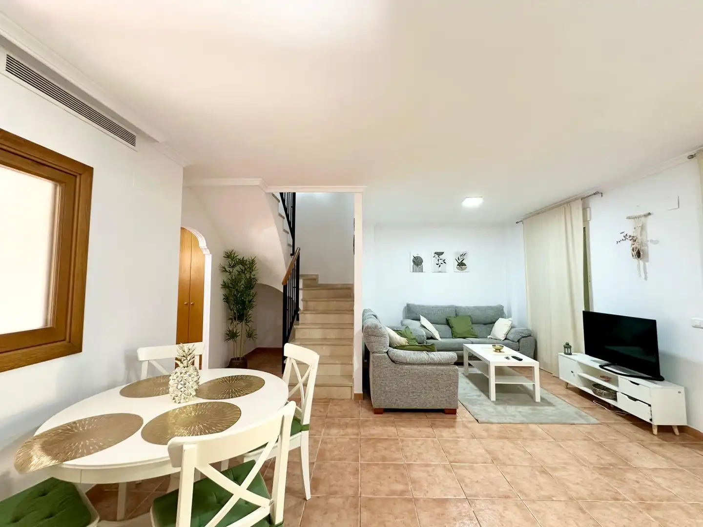 Sala d'estar de Casa adosada de lloguer en Alzira amb Jardí privat, Terrassa i Moblat