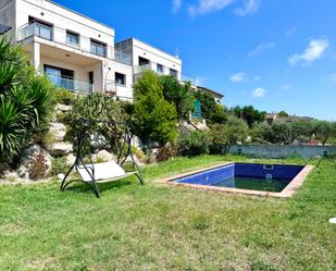 Piscina de Casa adosada en venda en Calafell amb Calefacció, Jardí privat i Terrassa