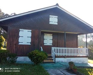 Vista exterior de Casa o xalet en venda en Oleiros amb Parquet, Moblat i Rentadora