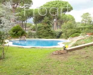 Swimming pool of House or chalet for sale in Riells i Viabrea  with Air Conditioner, Heating and Private garden