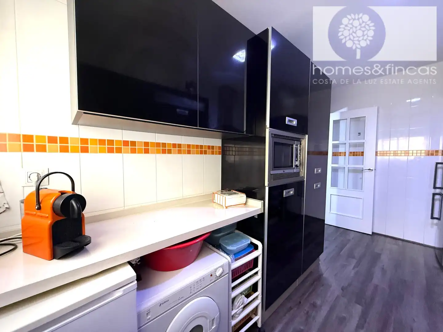 Küche von Wohnung zum Verkauf in Ayamonte mit Klimaanlage und Balkon