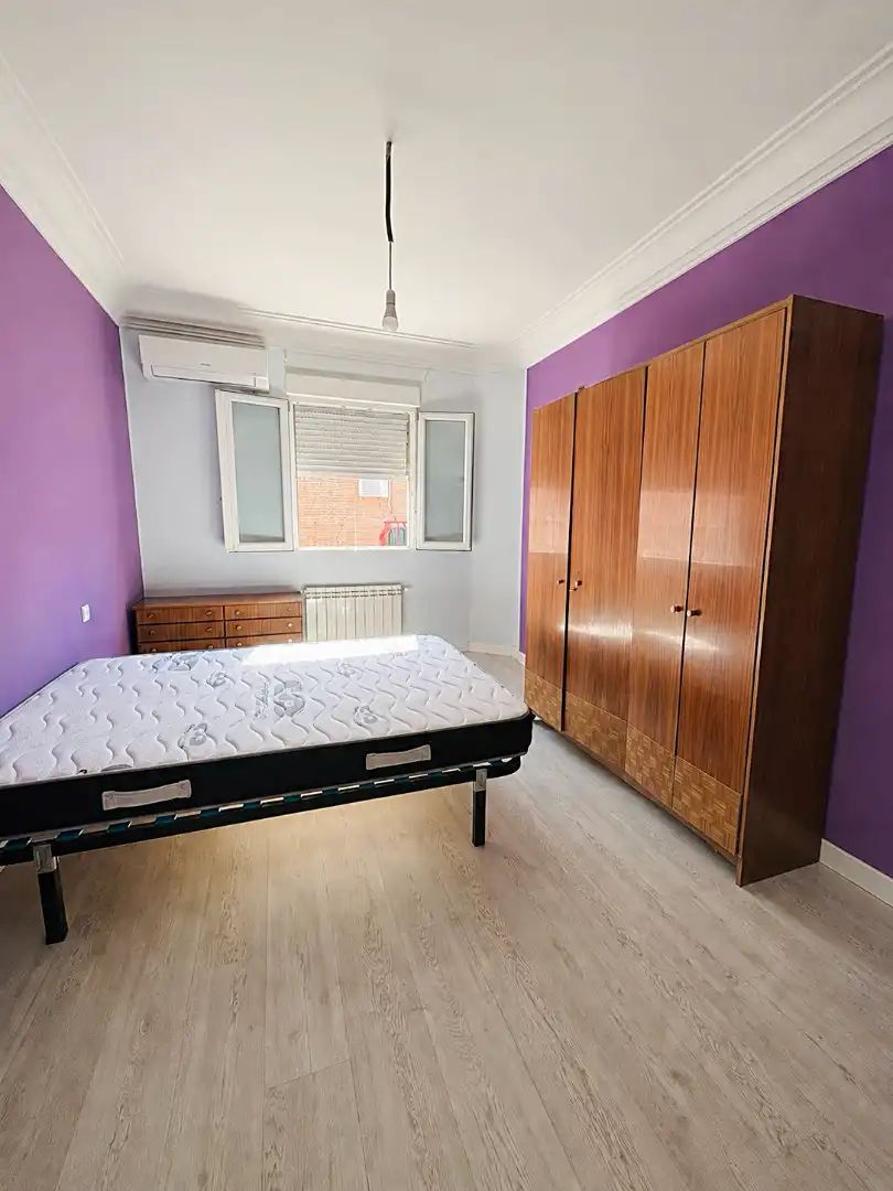 Schlafzimmer von Wohnung zum Verkauf in Madrid mit Klimaanlage und Balkon