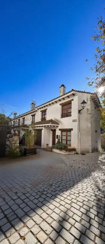 Vista exterior de Casa adosada en venda en Olmeda de las Fuentes amb Calefacció, Jardí privat i Terrassa