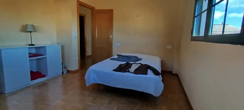 Dormitori de Casa adosada en venda en Doñinos de Salamanca amb Calefacció, Jardí privat i Moblat