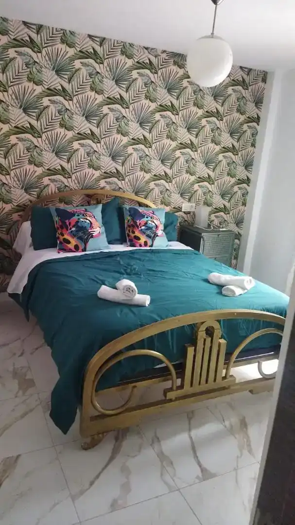 Dormitori de Casa adosada de lloguer en Martos amb Aire condicionat, Moblat i Rentadora