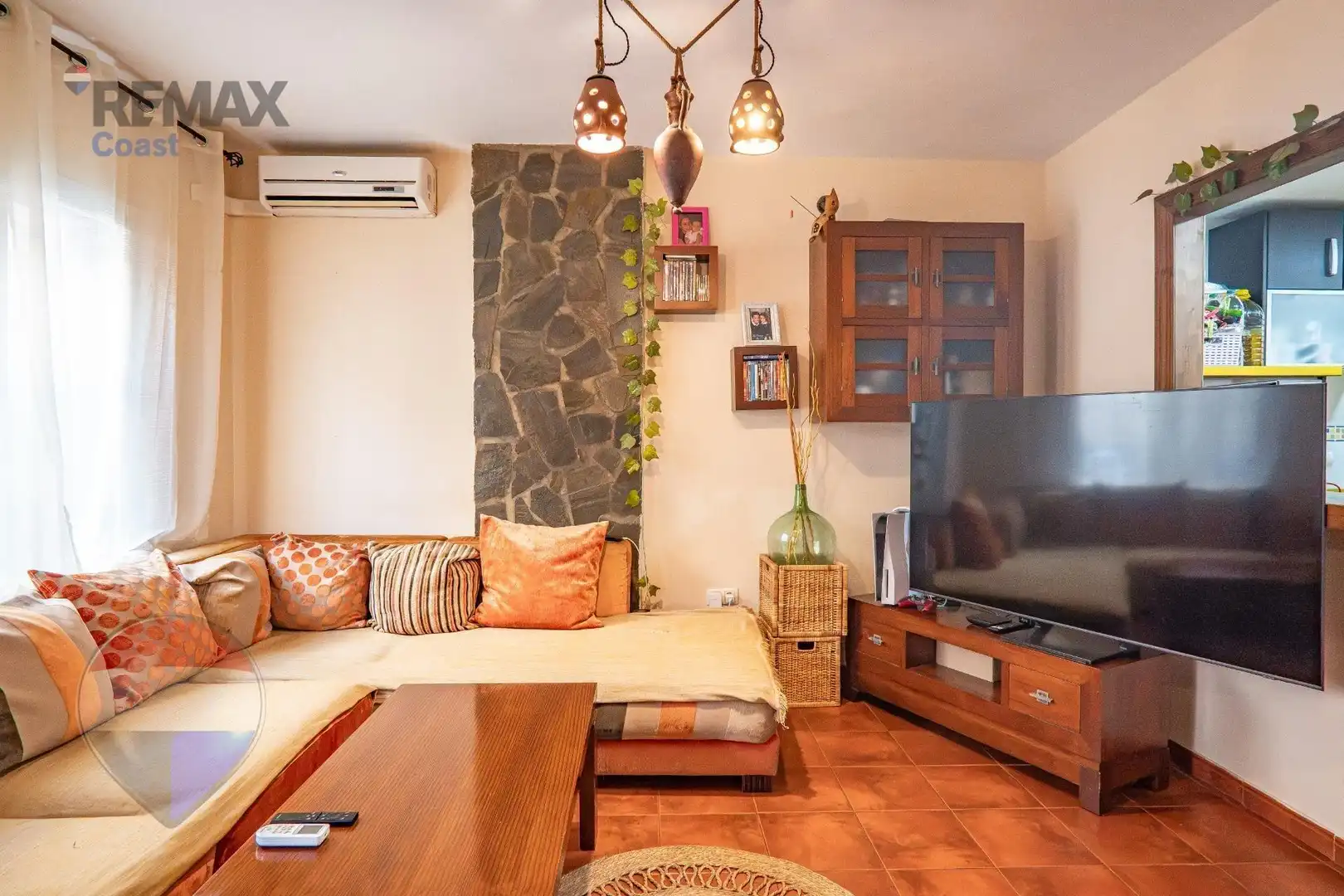 Sala d'estar de Casa adosada en venda en Cártama amb Piscina comunitària