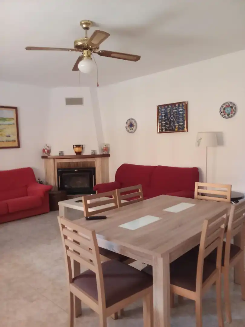 Sala d'estar de Casa o xalet en venda en Cullera amb Aire condicionat, Jardí privat i Moblat