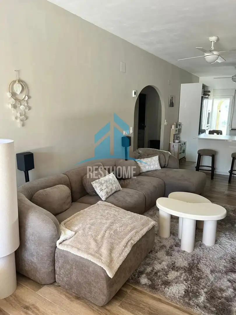 Sala d'estar de Casa adosada en venda en Moraira amb Aire condicionat, Jardí privat i Terrassa