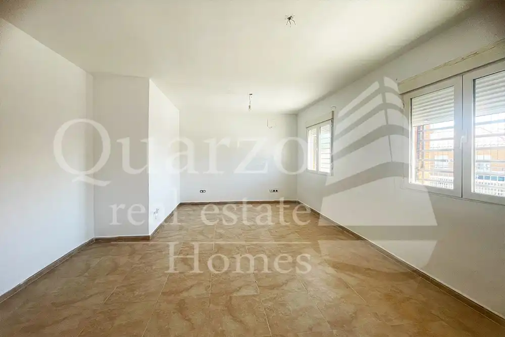 Sala d'estar de Casa adosada en venda en La Mata amb Jardí privat