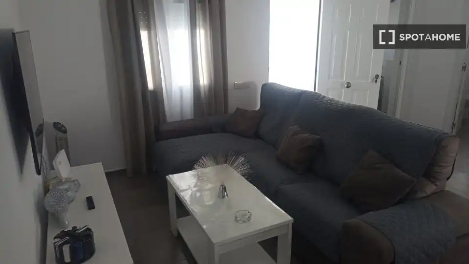 Sala de estar de Apartamento para compartir en Barbate con Aire acondicionado, Terraza y Amueblado