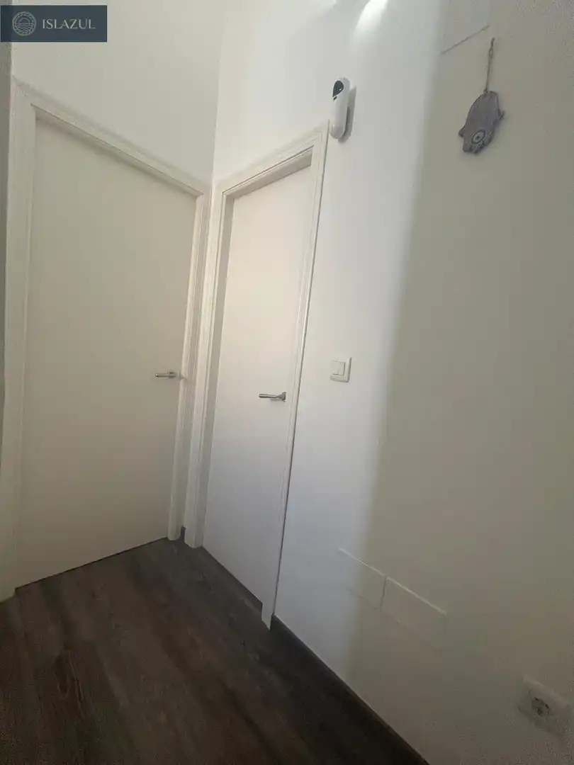 Dormitori de Apartament en venda en Isla Cristina amb Aire condicionat, Jardí privat i Terrassa