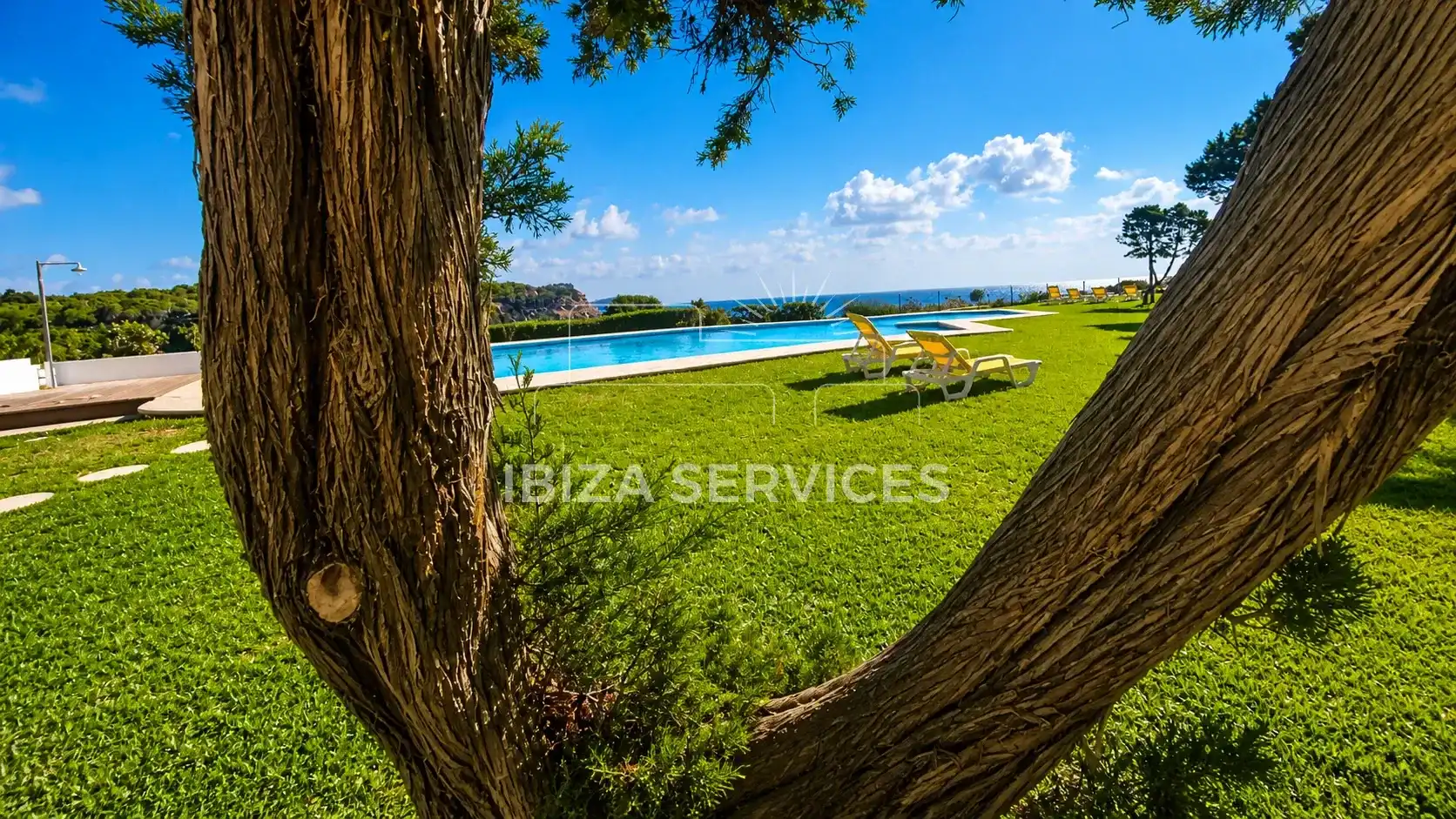 Jardín de Piso de alquiler en Santa Eulària des Riu con Aire acondicionado, Jardín privado y Piscina