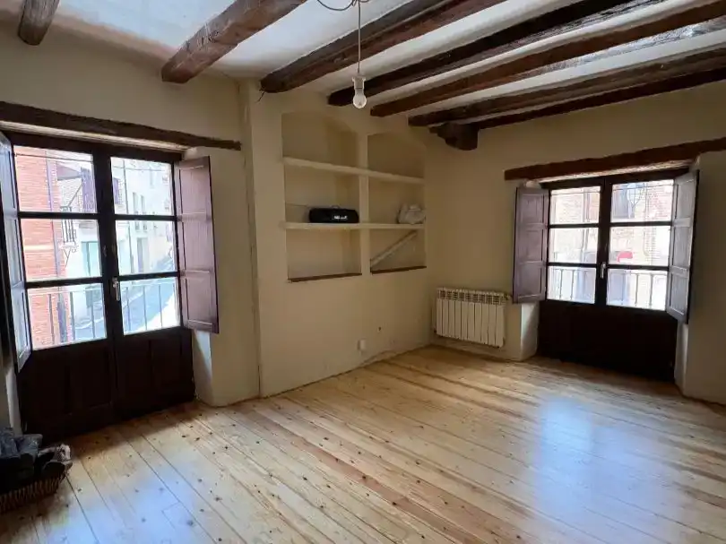 Sala d'estar de Casa adosada en venda en Simancas amb Balcó