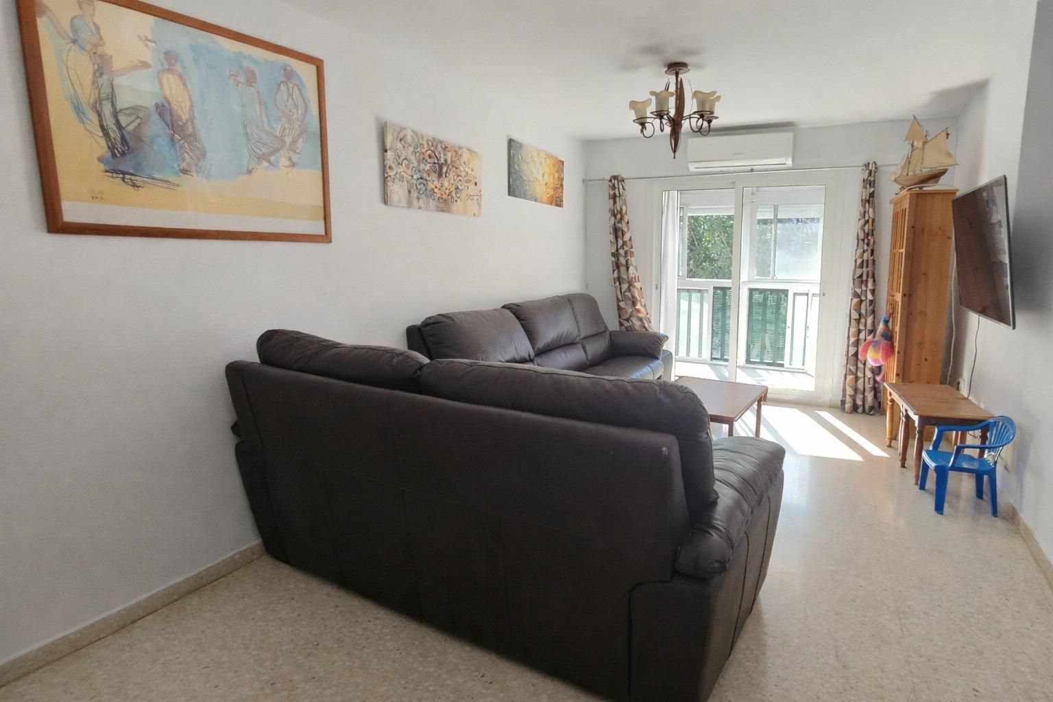 Living room of Flat for sale in Benalmádena  with Air Conditioner, Private garden and Terrace