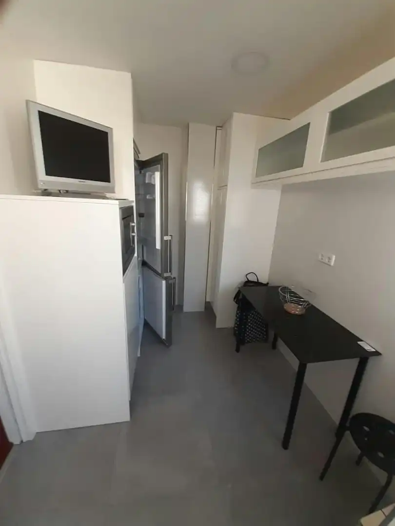 Kitchen of Flat for share in Madrid  with Private garden, Washing machine and TV