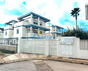 Exterior view of Single-family semi-detached for sale in Oliva  with Air Conditioner, Terrace and Community pool