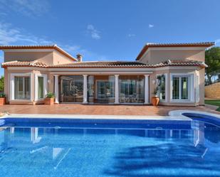 Vista exterior de Casa o xalet en venda en Moraira amb Aire condicionat, Terrassa i Piscina