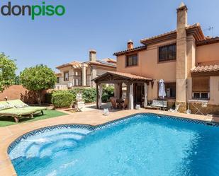 Swimming pool of Single-family semi-detached for sale in La Zubia  with Heating, Private garden and Terrace