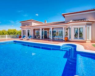 Vista exterior de Casa o xalet en venda en Moraira amb Aire condicionat, Terrassa i Piscina