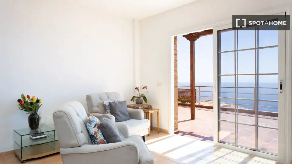 Sala de estar de Apartamento para compartir en El Rosario con Aire acondicionado, Terraza y Amueblado