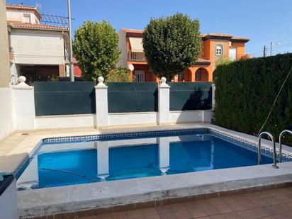 Swimming pool of House or chalet for sale in Churriana de la Vega  with Air Conditioner, Heating and Private garden