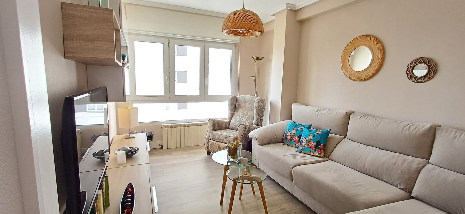 Living room of Flat for sale in Gijón   with Heating, Terrace and Swimming Pool