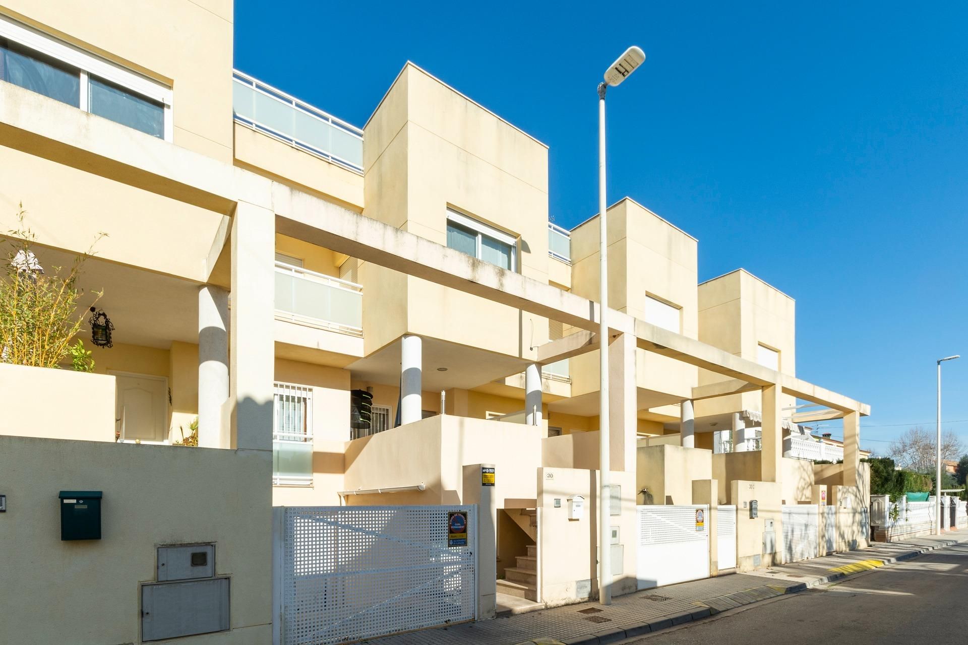 Exterior view of Single-family semi-detached for sale in Gandia  with Air Conditioner, Heating and Terrace
