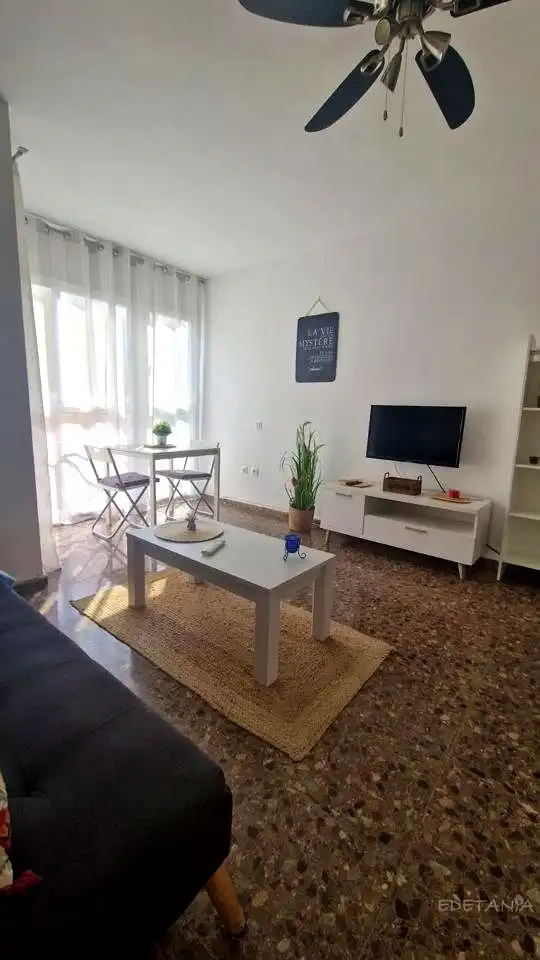 Sala d'estar de Pis de lloguer en Moncada amb Aire condicionat i Moblat