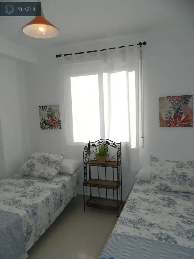 Habitación de Dúplex de alquiler en Isla Cristina con Terraza, Balcón y Piscina comunitaria