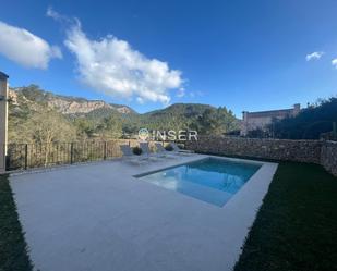 Vista exterior de Casa o xalet en venda en Puigpunyent amb Aire condicionat, Jardí privat i Terrassa