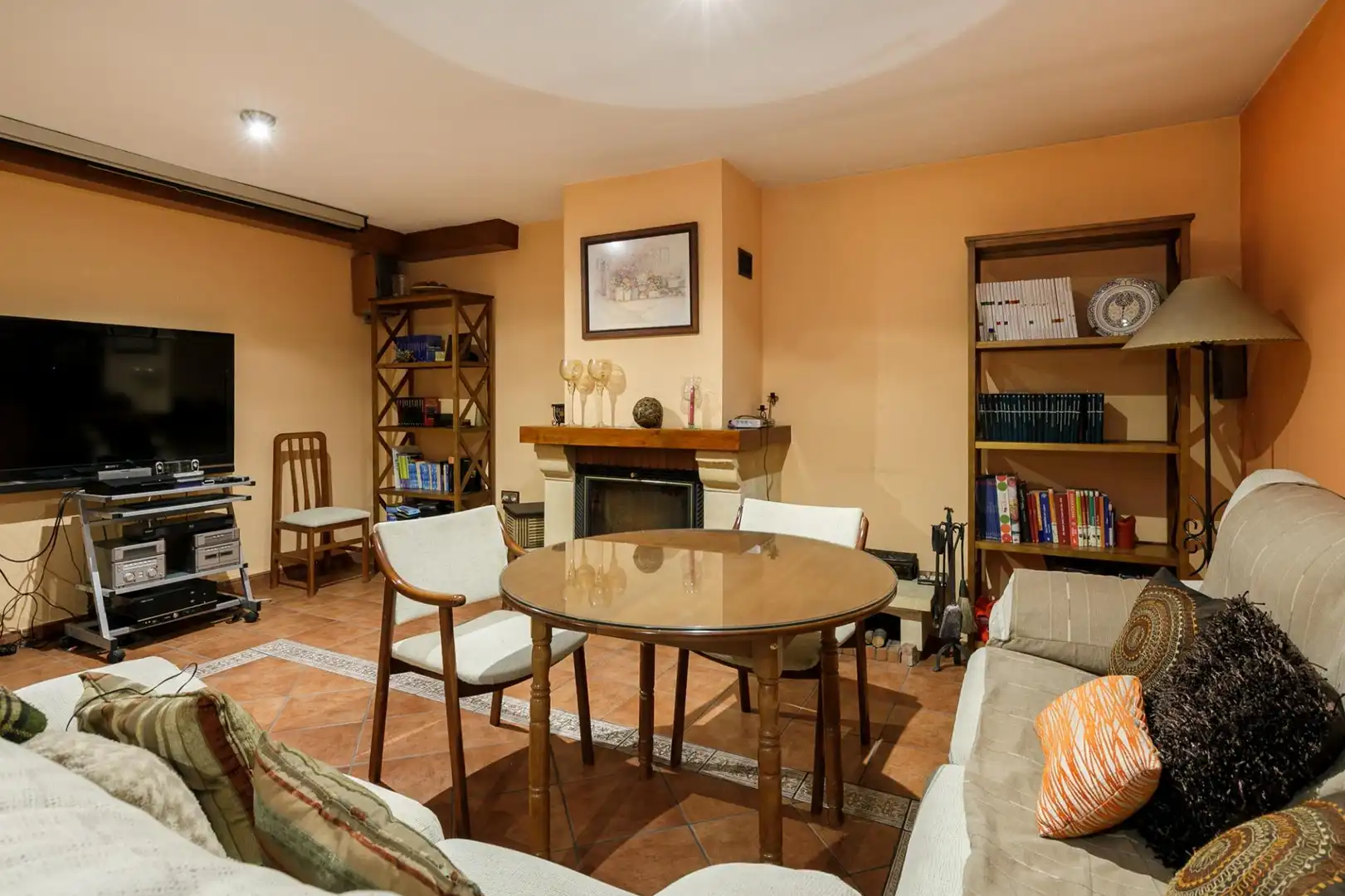 Sala de estar de Casa adosada en venta en Granada con Aire acondicionado, Calefacción y Terraza