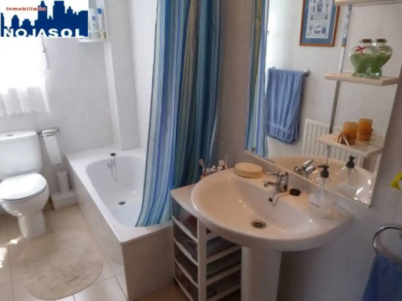 Bany de Apartament de lloguer en Arnuero amb Calefacció, Jardí privat i Terrassa