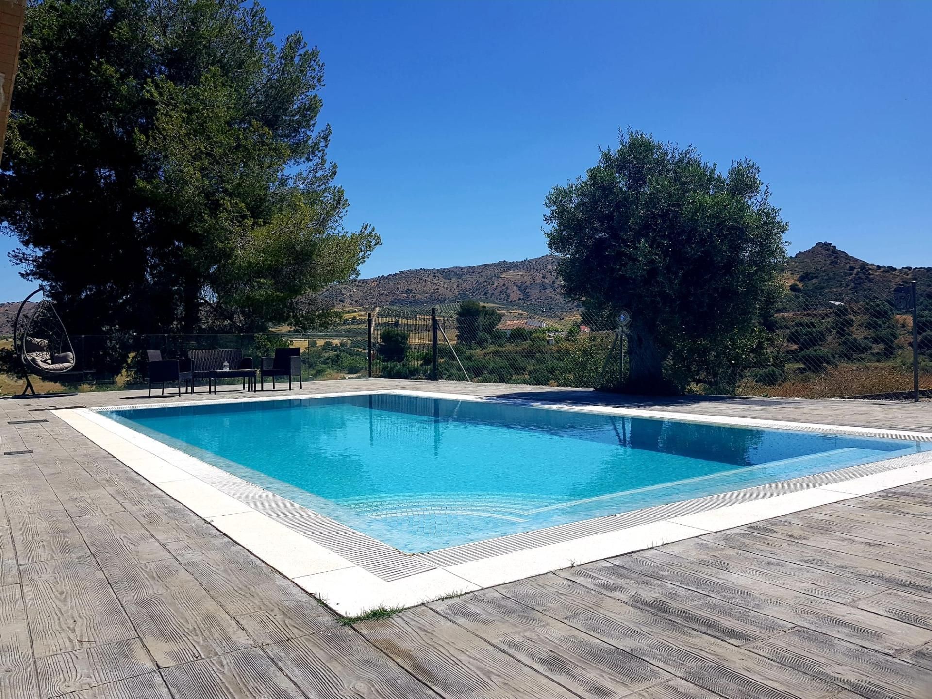 Swimming pool of House or chalet for sale in Pizarra  with Air Conditioner, Heating and Private garden