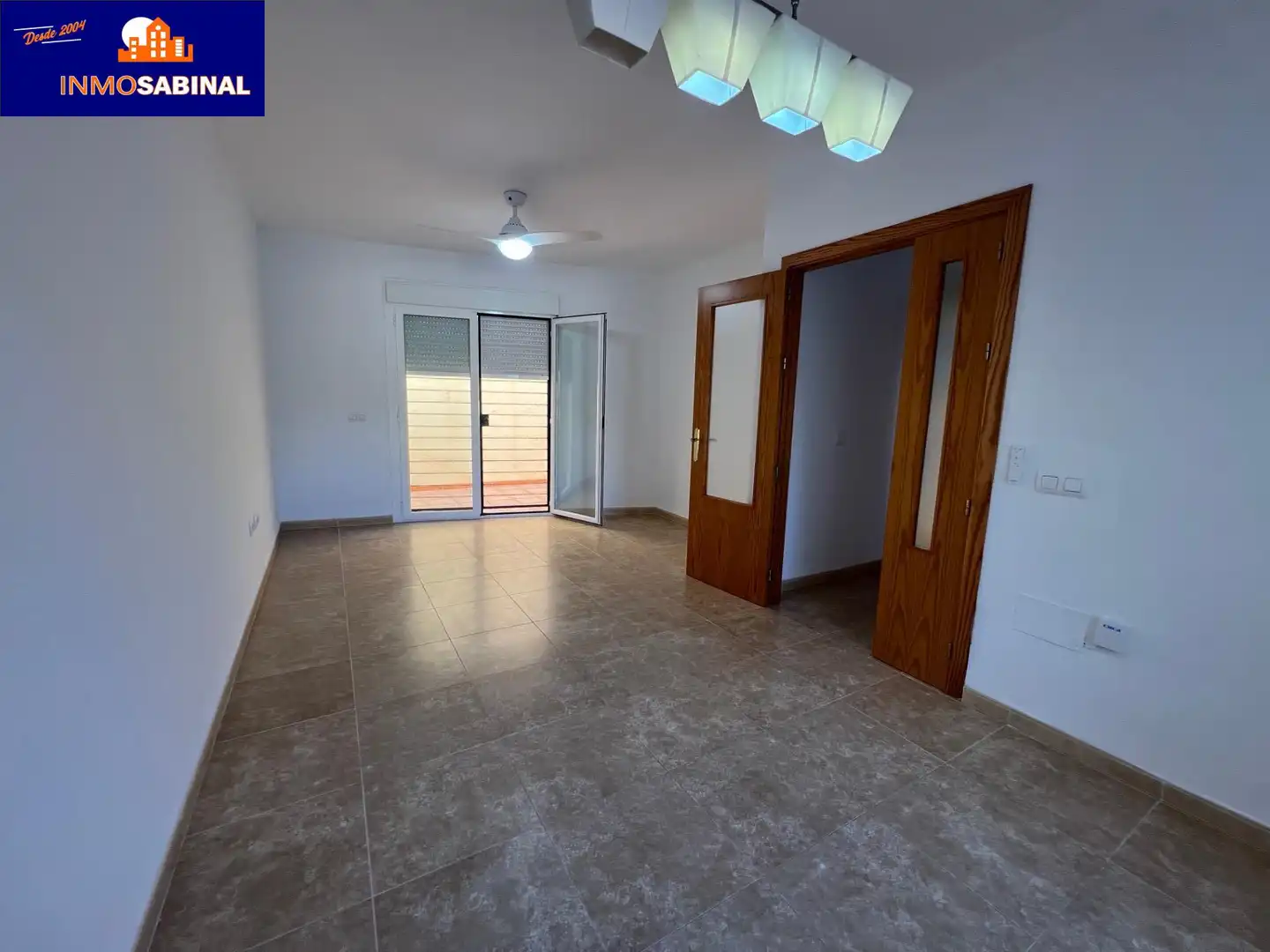 Sala de estar de Casa adosada de alquiler en Roquetas de Mar con Aire acondicionado, Terraza y Piscina comunitaria
