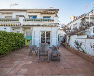 Jardí de Casa adosada en venda en Cunit amb Aire condicionat, Jardí privat i Terrassa