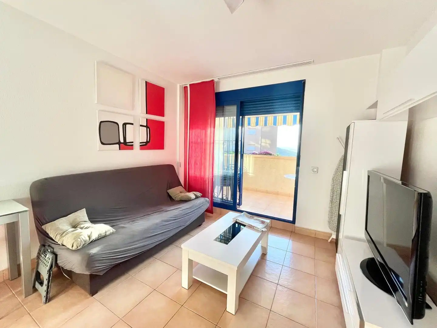 Sala d'estar de Apartament de lloguer en La Manga del Mar Menor amb Aire condicionat, Calefacció i Piscina