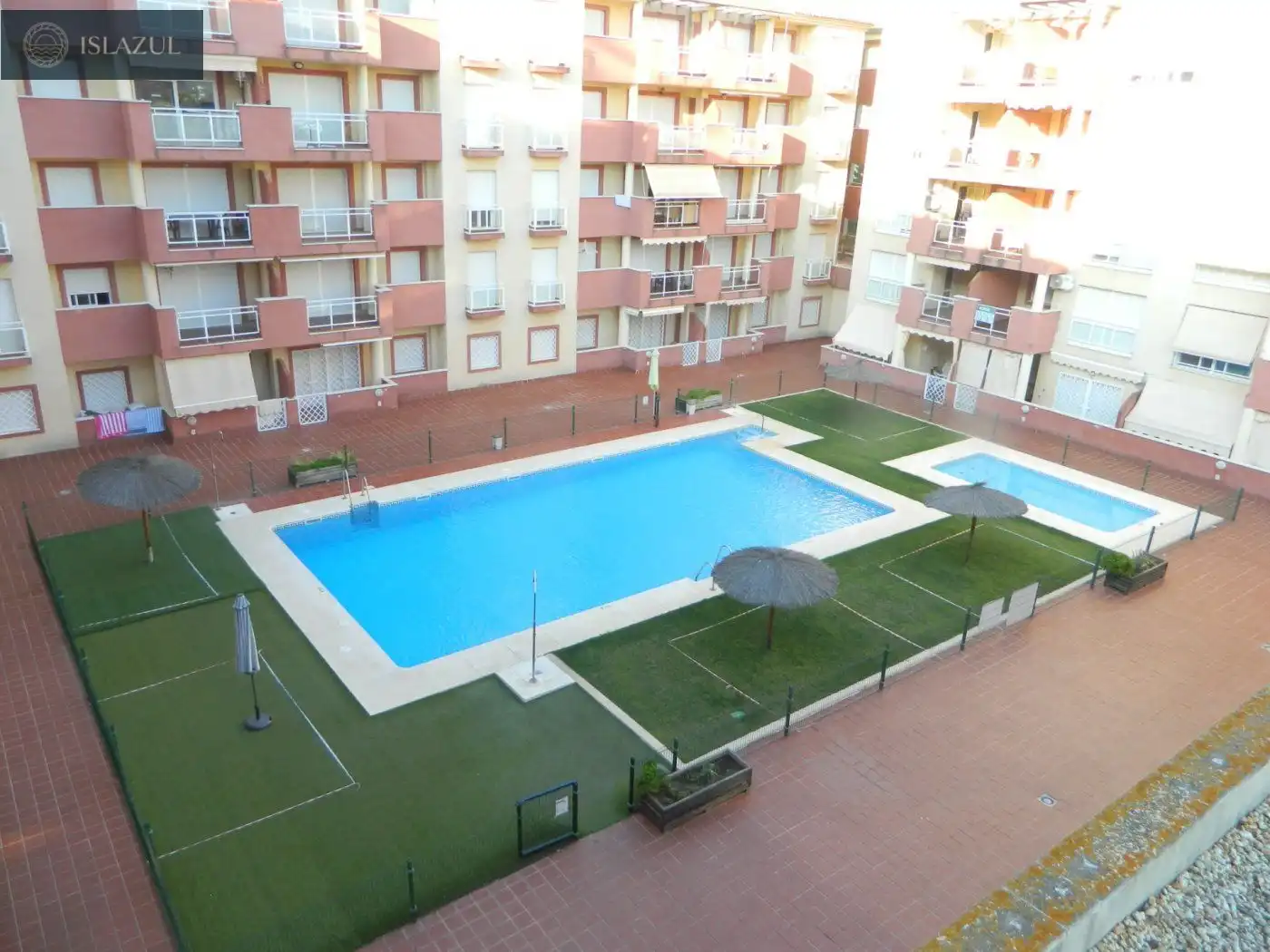 Piscina de Dúplex de alquiler en Isla Cristina con Terraza, Balcón y Piscina comunitaria